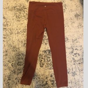 Athleta Dark Orange / Red Salutation 7/8 Leggings